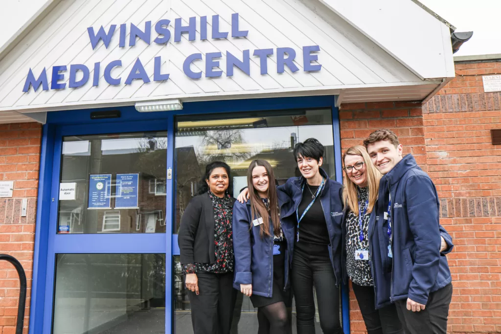 WInshill Medical Centre Team Members Standing outside of building